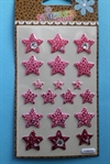  Stjerne stickers nogle med lille glitter sten. Arket måler ca. 7,5 x 12,5 cm.